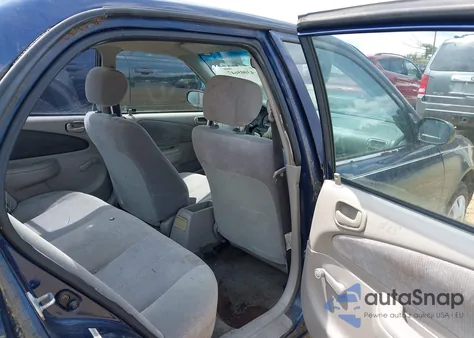 2001 Toyota Corolla Ce from USA, damaged, VIN 2T1BR12E21C386764